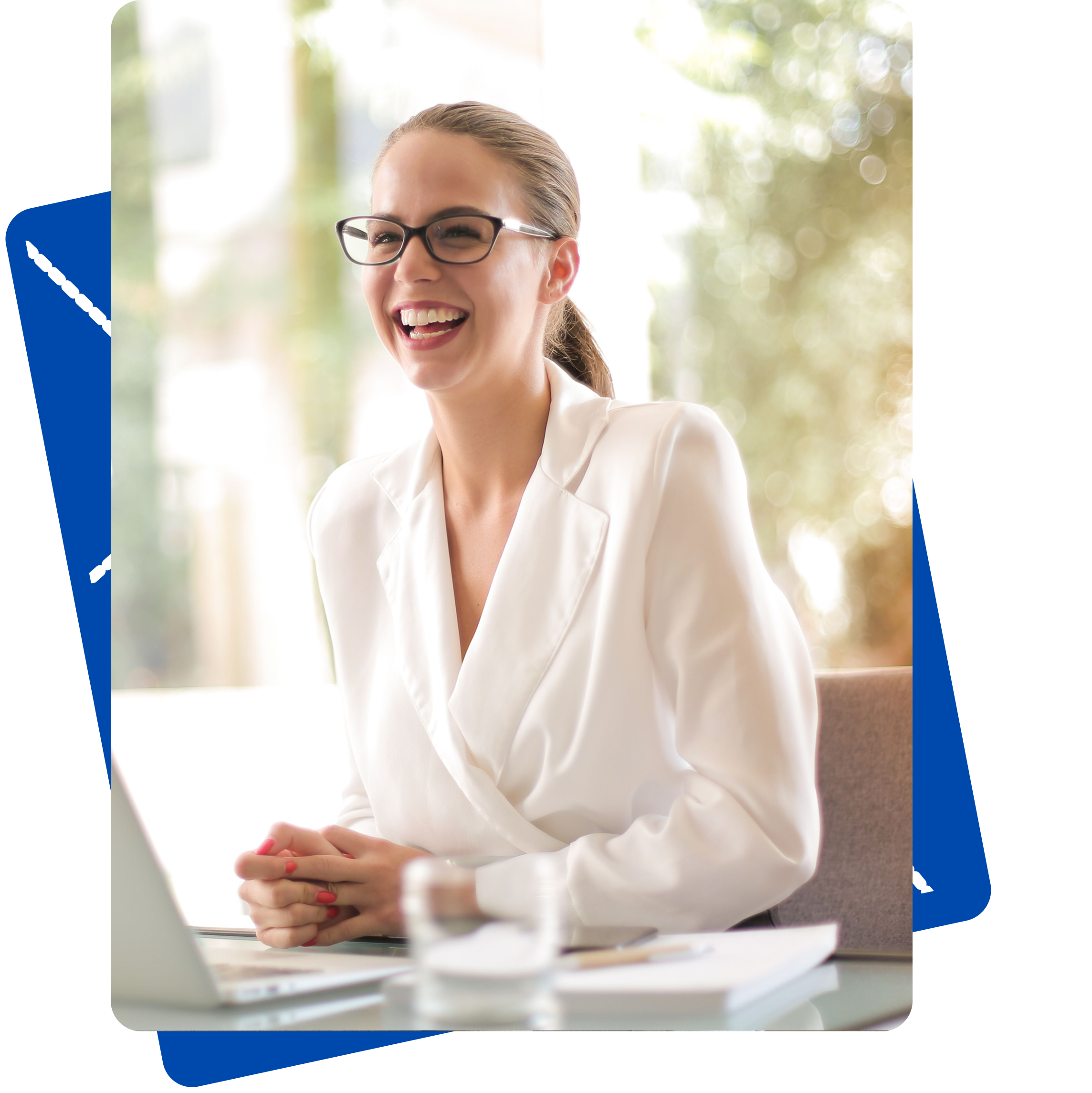 Professional smiling at her desk